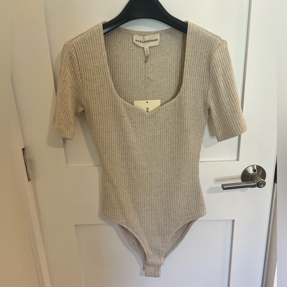 New, never worn, with tags Mara Hoffman XS bodysuit.